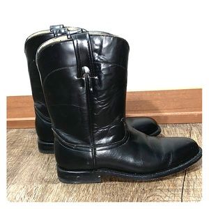 Black leather cowboy boots.